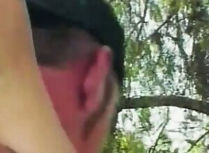 Petite Asian girl with pigtails has a white guy fucking her cunt outside