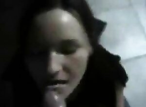 Horny brunette licks hard cock at home