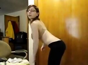 Nerdy babe teases with her monster tits
