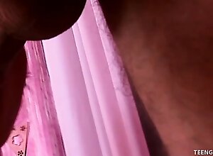 Sexy brunette teen Andrea is slurping on a hard stick while laying on her side