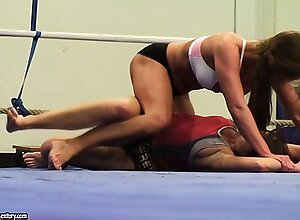 Nelly and Cathy rub their sexy naked bodies against one another in the ring