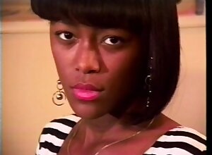 Ebony goddess in stockings and hairy pussy plays with black dildo