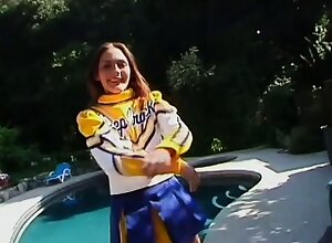 Cock hungry cheerleader strips down and fucks her stud by the pool