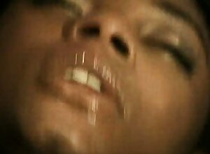 Luscious caramel babes share their passion for black cock on the bed